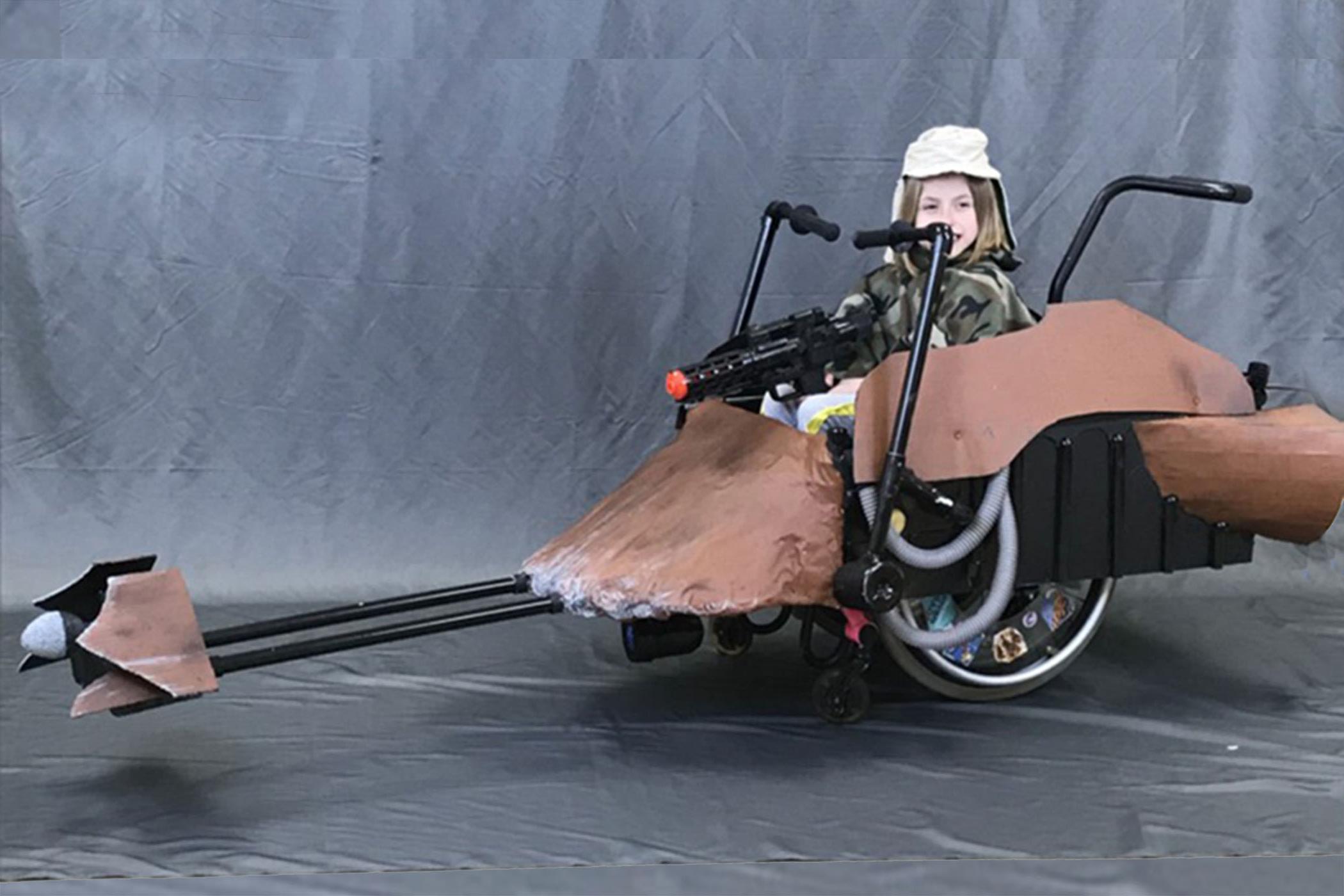 This young Princess Leia was thrilled with her Endor speeder bike wheelchair Halloween costume custom-built by Randolph College SPS.